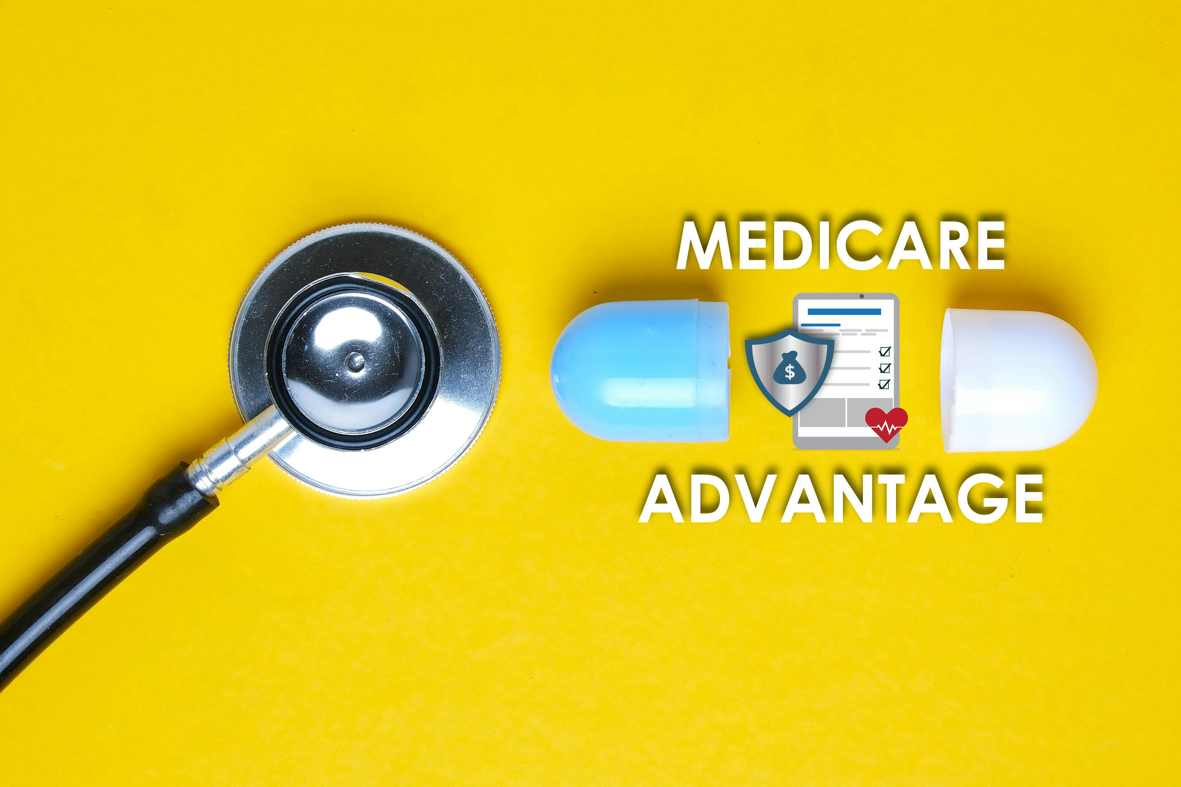 A stethoscope next to a Medicare Advantage graphic on a yellow background.